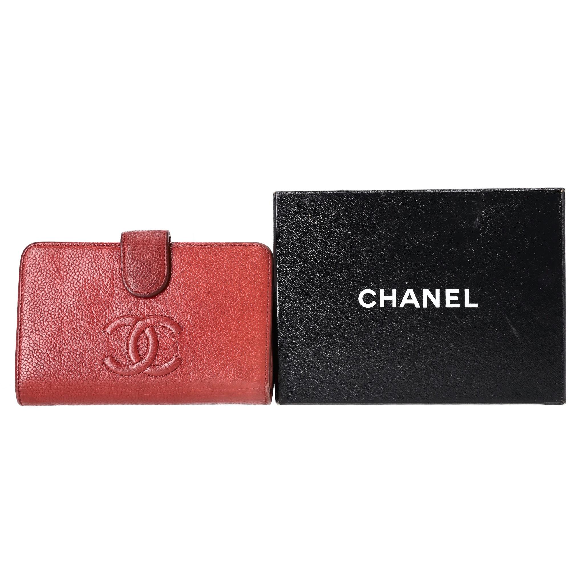 Chanel Caviar Leather Timeless 'CC' Logo Wallet

Red wallet crafted from signature caviar leather with 'CC' logo stitching to the front.

Featuring snap closure leading to multiple card slots and zipped coin pocket.

From 2012 Collection. Rrp