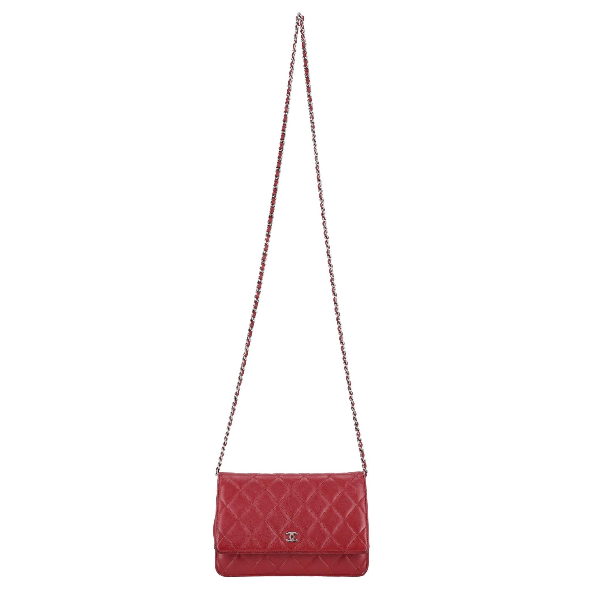 Chanel Caviar Leather Wallet On A Chain

Timeless red crossbody bag crafted of Chanel's signature caviar leather with diamond stitching.

Silver 'CC' logo to the front and iconic leather and chain shoulder strap.

Featuring rear open pocket,