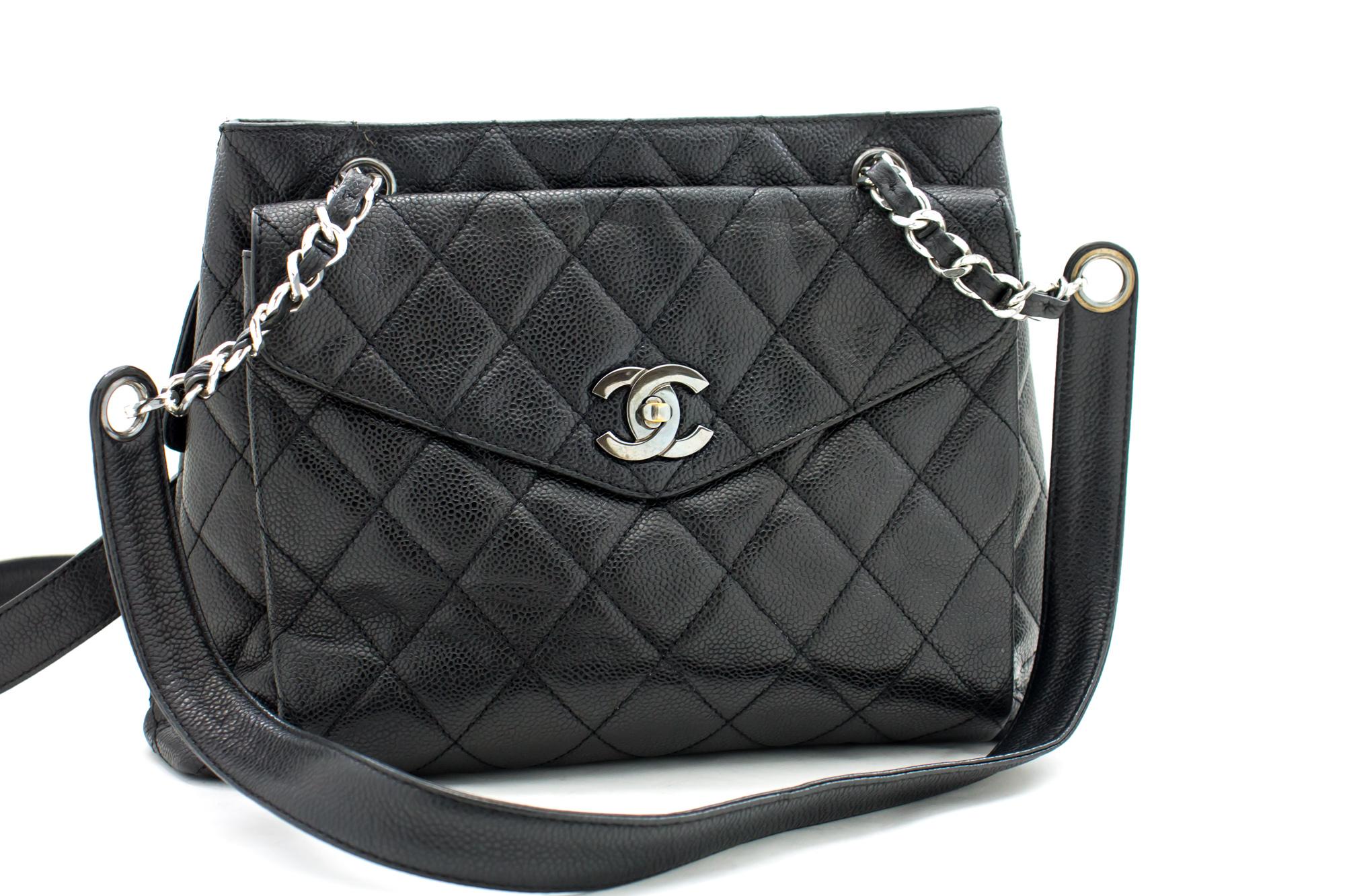 An authentic CHANEL Caviar Quilted Chain Shoulder Bag Black Leather Silver Hw. The color is Black. The outside material is Leather. The pattern is Solid. This item is Contemporary. The year of manufacture would be 1986.
Conditions & Ratings
Outside