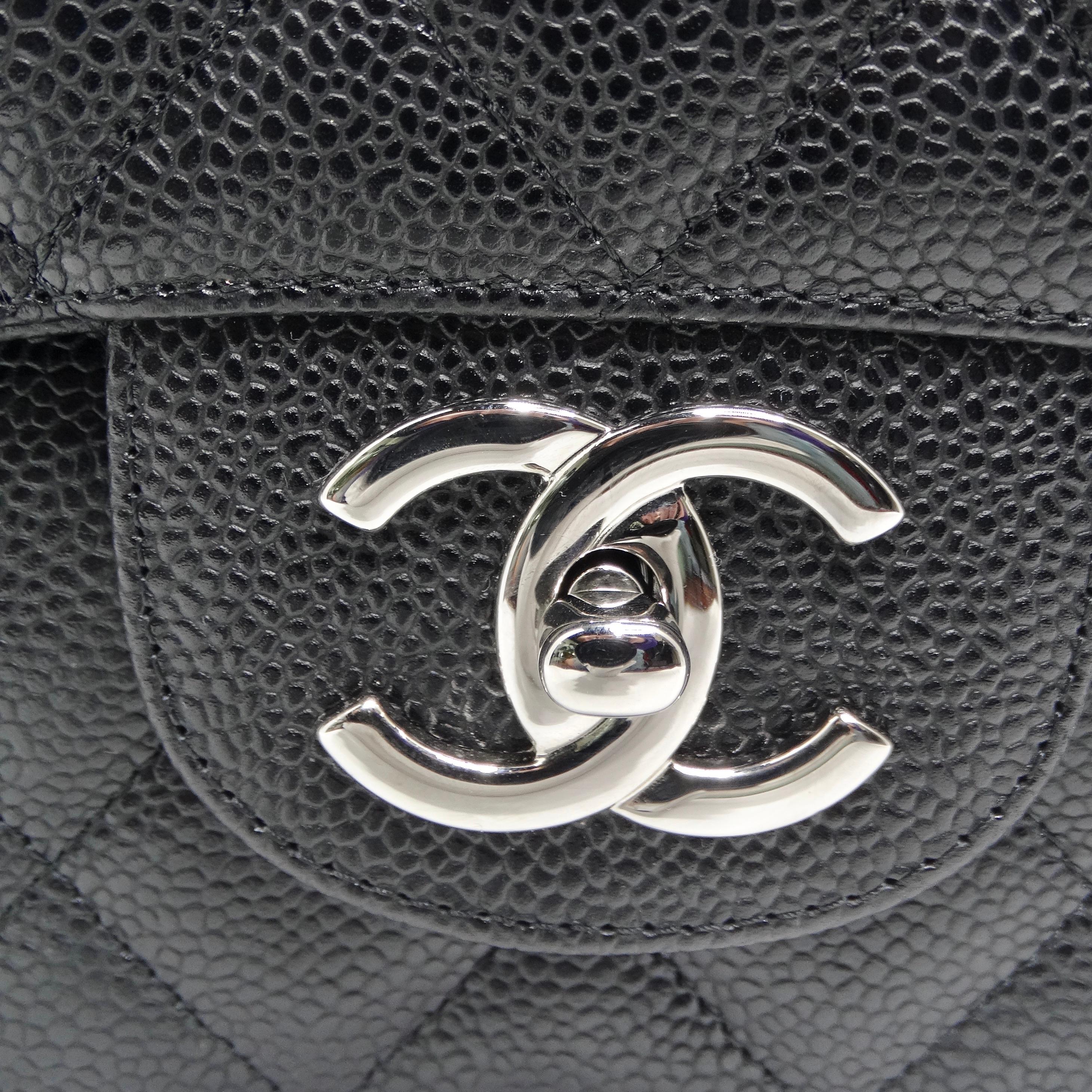 Introducing the Chanel Caviar Quilted Jumbo Double Flap Black Shoulder Bag, an icon of timeless elegance and sophistication. This bag is more than just an accessory; it's a statement piece that defines your style. Crafted from luxurious black