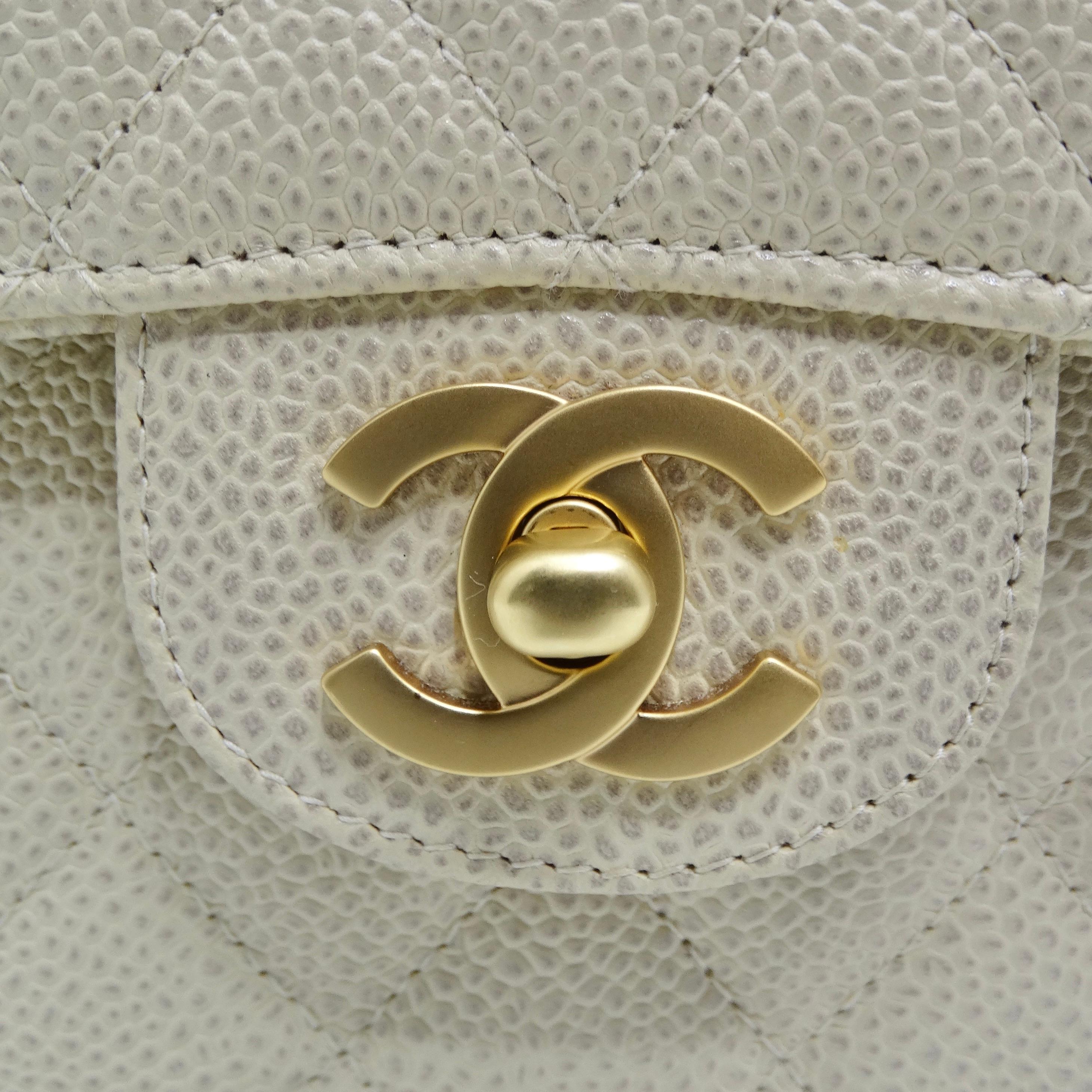 Do not miss out on the Chanel Caviar Quilted 2.55 Double Flap Beige Shoulder Bag, a true icon of style, luxury, and timeless beauty. This bag is more than just a fashion accessory; it's a statement of your impeccable taste and a symbol of enduring