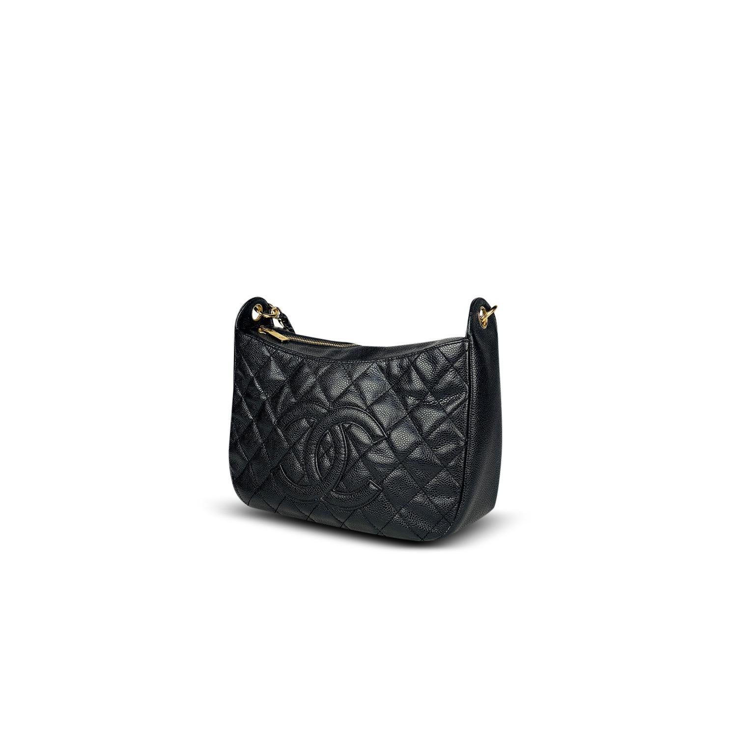 Black quilted Caviar leather Chanel Timeless shoulder bag with

– Gold-tone hardware
– single convertible chain-link and leather shoulder strap
– Dual slit pockets at exterior, tonal grosgrain lining, three pockets at interior wall; one with zip