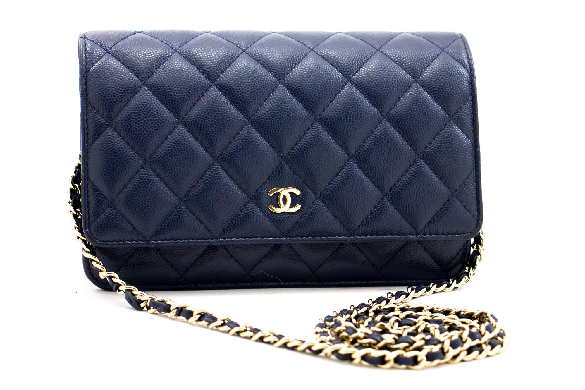 An authentic CHANEL Caviar Wallet On Chain WOC Navy Shoulder Bag Crossbody Gold. The color is Navy. The outside material is Leather. The pattern is Solid. This item is Contemporary. The year of manufacture would be 1986.
Conditions & Ratings
Outside