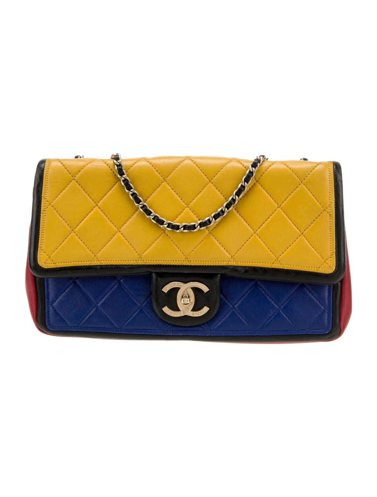 CHANEL YELLOW BLUE MONDRIAN SINGLE FLAP BAG MEDIUM

This Chanel shoulder bag from the 2012-2013 collection by Karl Lagerfeld features a colorblock pattern in blue, red, and yellow leather. Designed with gold-tone hardware and a chain-link shoulder