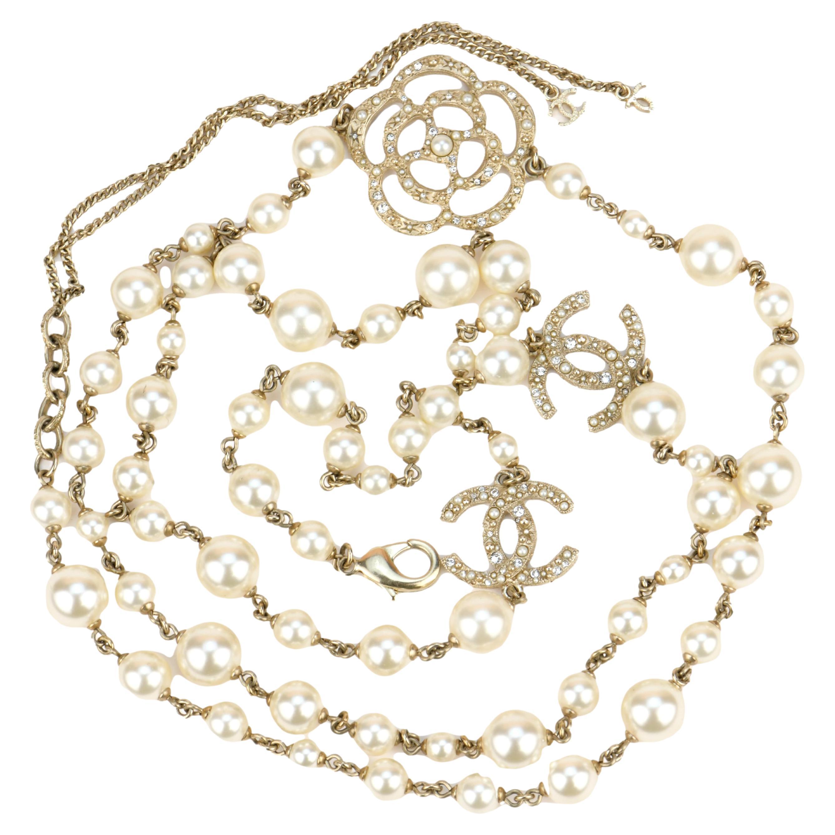 Chanel CC 2014 Crystal Camellia Pearl Long Necklace at 1stDibs
