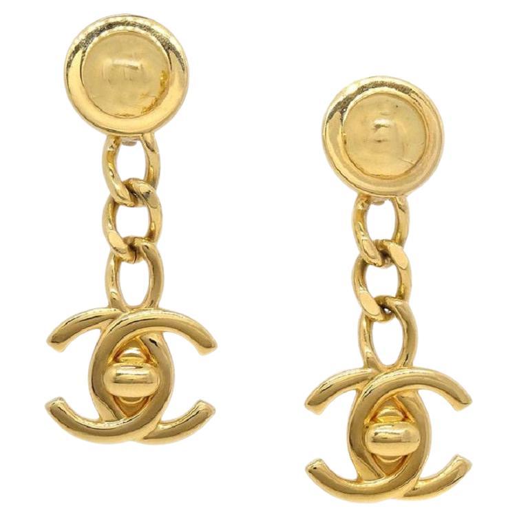 CHANEL CC 24K Gold Tone Metal Turnlock Chain Dangle Drop Earrings For Sale  at 1stDibs