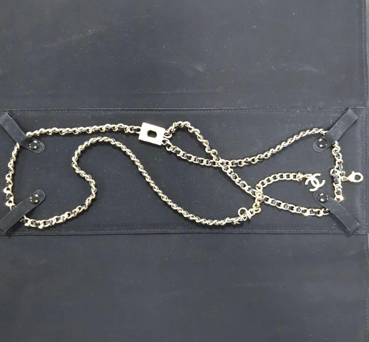 Chanel CC necklace/Belt with leather chains. 
Very edgy and modern looking. 
Stamp on the clasp B17P. 
Total length-97 cm
This necklace also can be worn as a belt.

Comes with the original box.


