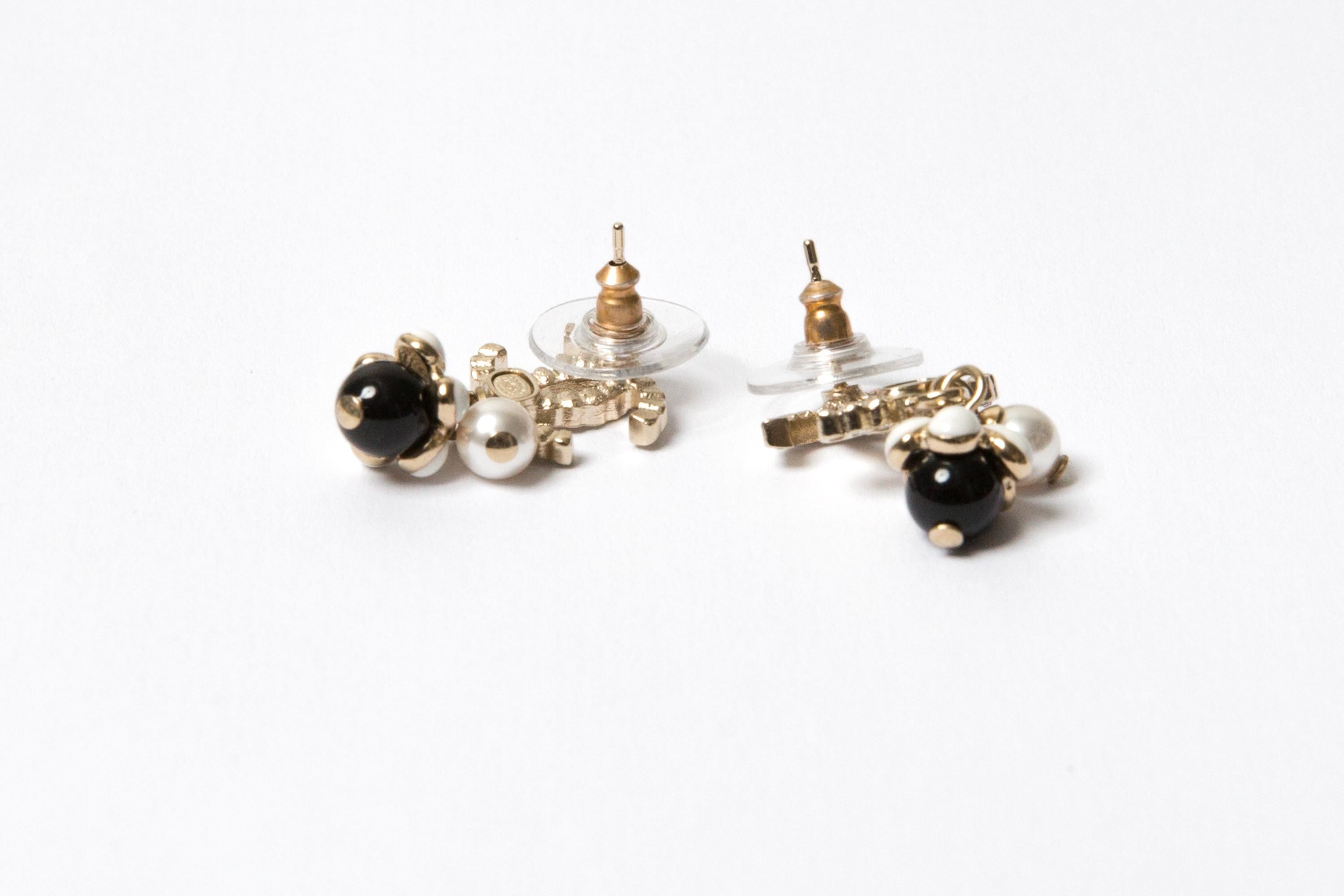 Women's Chanel CC Black and Gold Tone Earrings For Sale