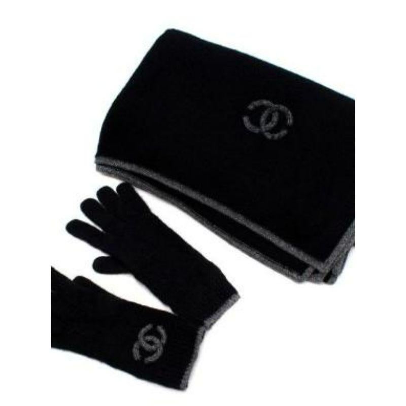 Chanel Logo Black and Grey Cashmere Scarf and Gloves

- Mid weight 
- Fine knit body 
- Grey embroidered knit CC logo 
- Grey trim 

Materials:
74% Cashmere 
24% Silk 
1% Polyamide 
1% Metalic polyester 

Made in Italy 

Dry clean only 

PLEASE