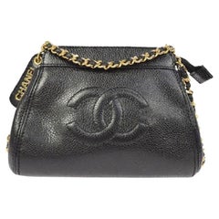 CHANEL CC Schwarze Mini-Umhängetasche aus Leder in Kaviar mit Golddetails