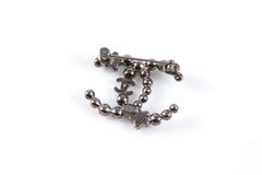 Chanel CC Black Comete Brooch