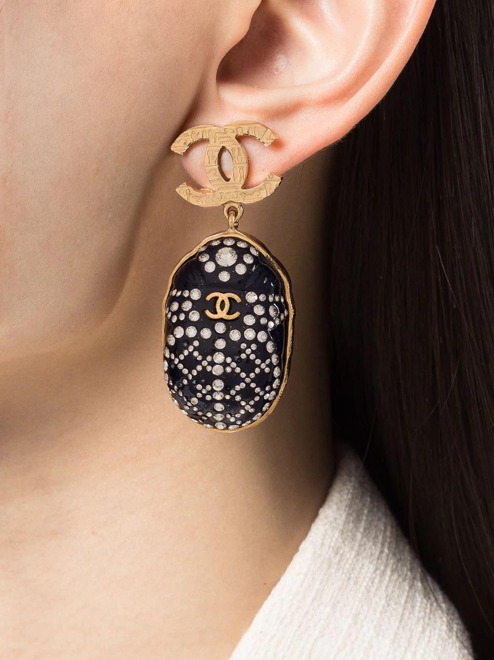 As seen on the runway, these pre-owned earrings take inspiration from ancient Egypt. From the 2019 Métiers d'Art collection, the collection features popular amulets of Ancient Egypt and gives them and chic and modern twist. Featuring a blue scarab