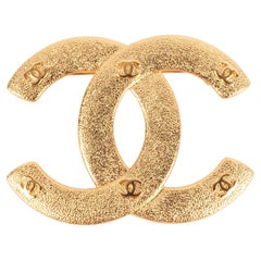 Broche Chanel CC años 90