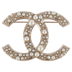 Chanel cc brooch 2013