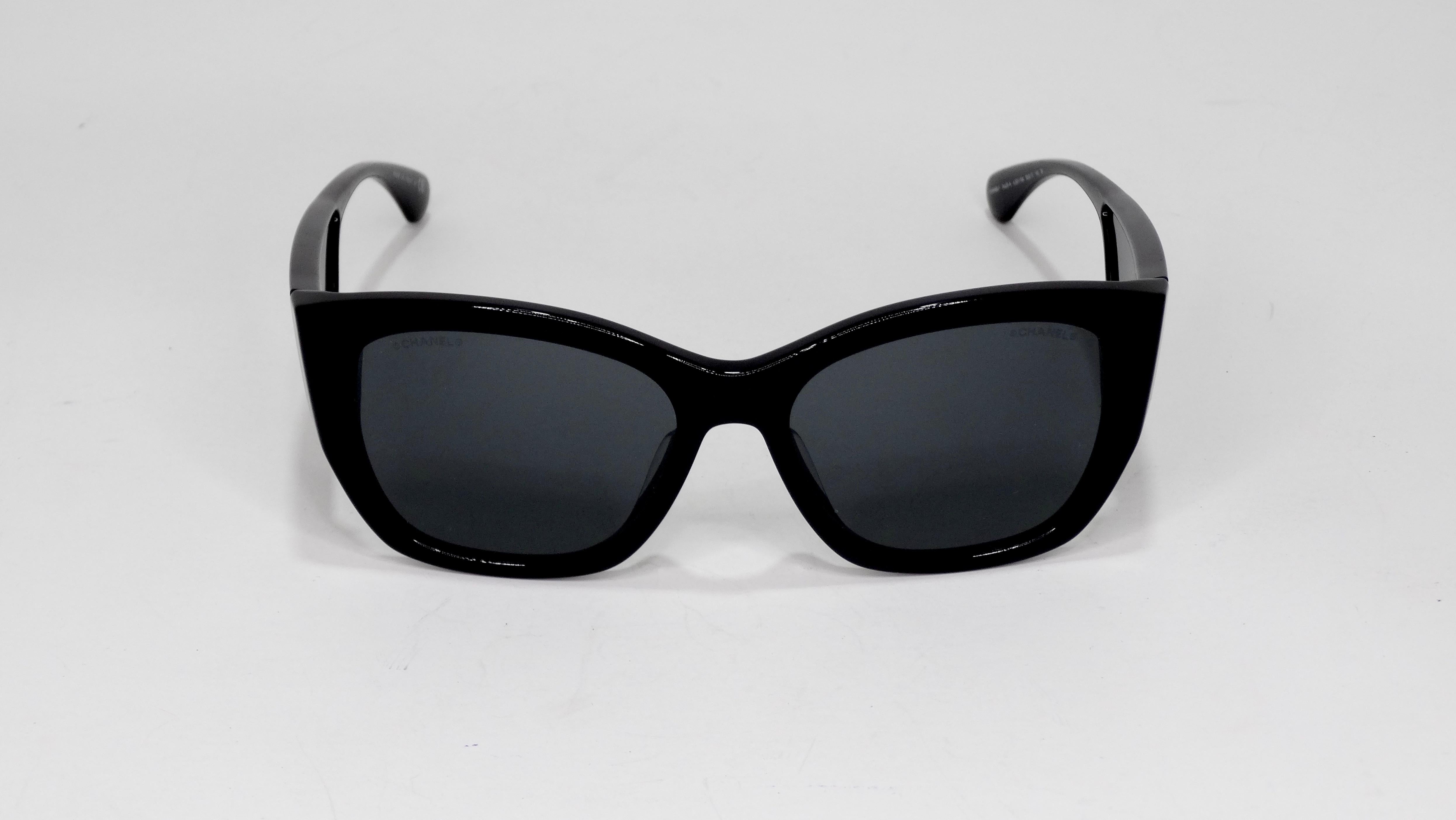  Circa 2020, these sunglasses feature a black butterfly style frame with white CC's on the arms. Stamped Chanel made in Italy. Great to wear everyday with all your favorite Chanel, Fendi or Gucci looks! Original box and case included. 
