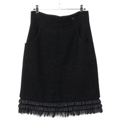 Chanel CC Rock aus Denim und Kaschmir mit Knopfleiste in Schwarz