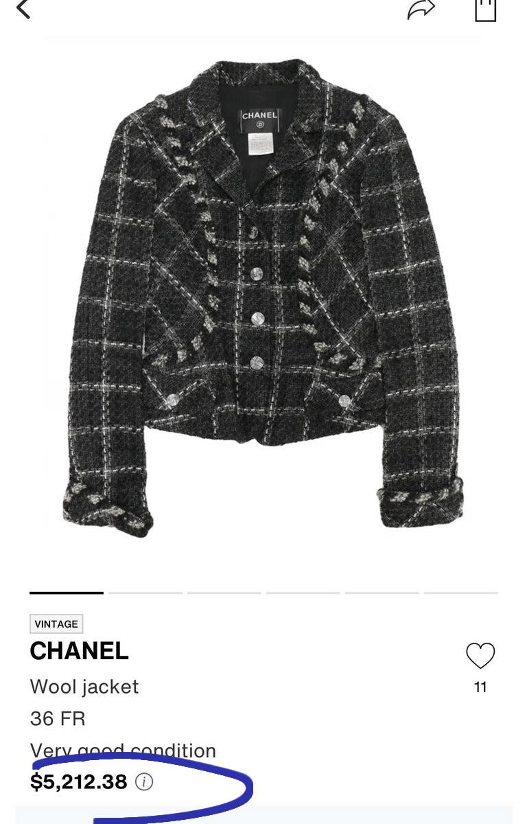 Rare stylish Chanel black tweed jacket with CC logo buttons.
Size mark 36 FR. Pristine condition.