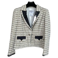 Chanel - Veste en tweed chatoyant à boutons CC