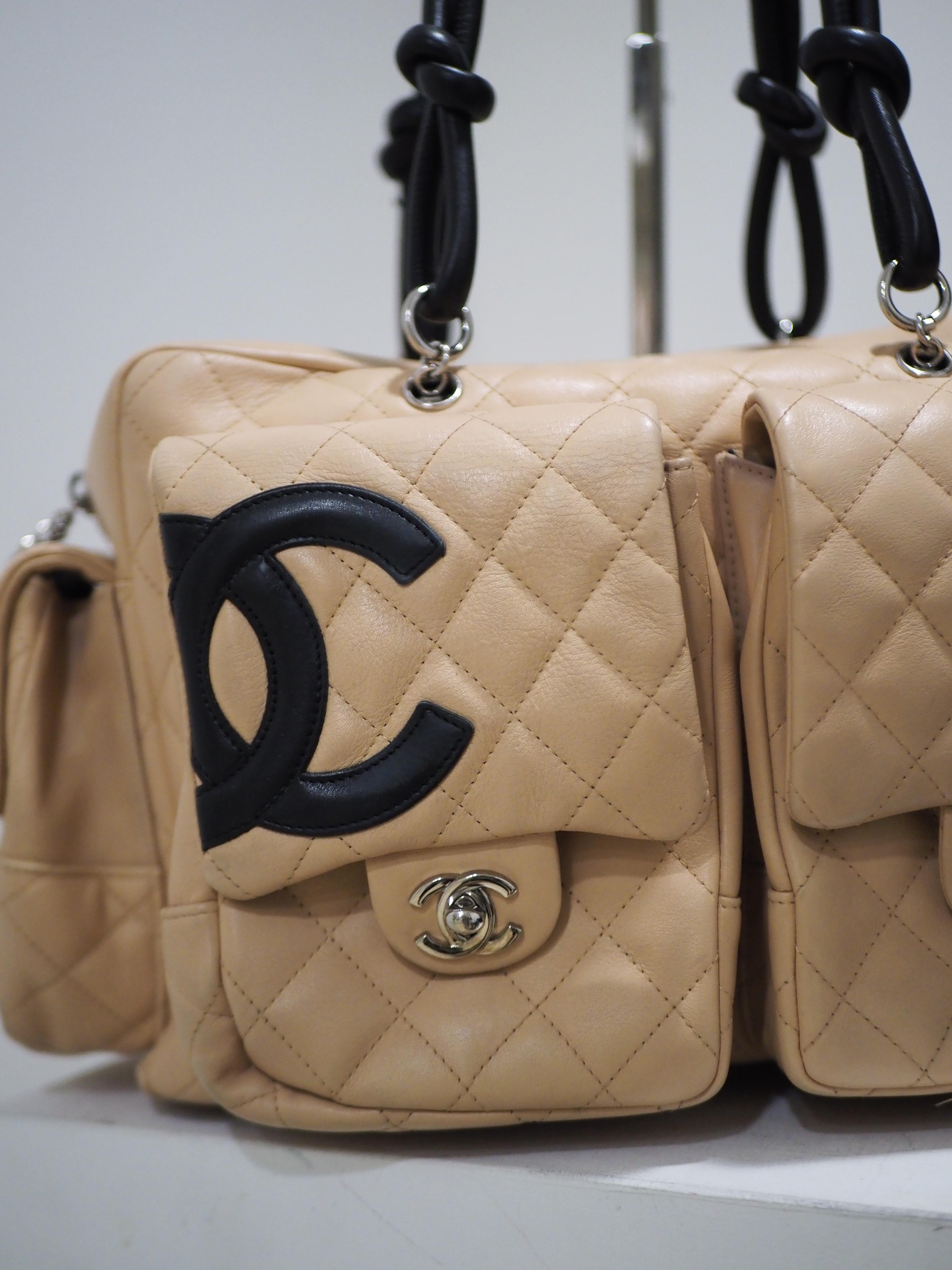 Chanel CC camel and black leather handbag shoulder bag
inside lining is not in good conditions

