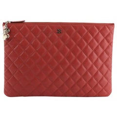 Chanel CC Casino O Case Clutch Quilted Lambskin Large