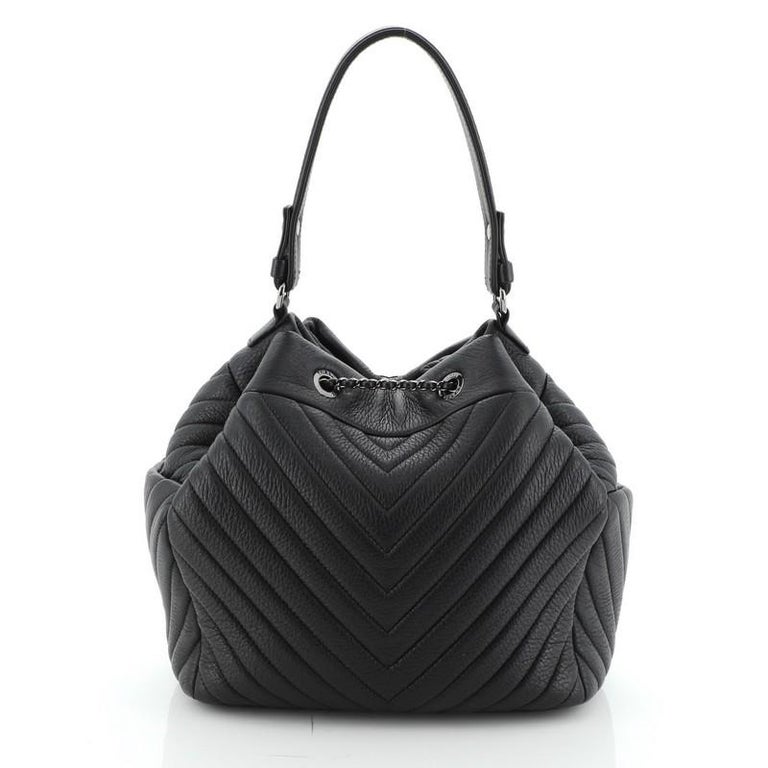 Chanel Black Chevron Quilted Calfskin Leather Drawstring Bucket Bag -  Yoogi's Closet