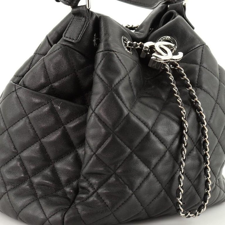 Chanel Vintage Black Quilted Lambskin Tassel CC Mini Bucket Bag Gold  Hardware, 1990 Available For Immediate Sale At Sotheby's