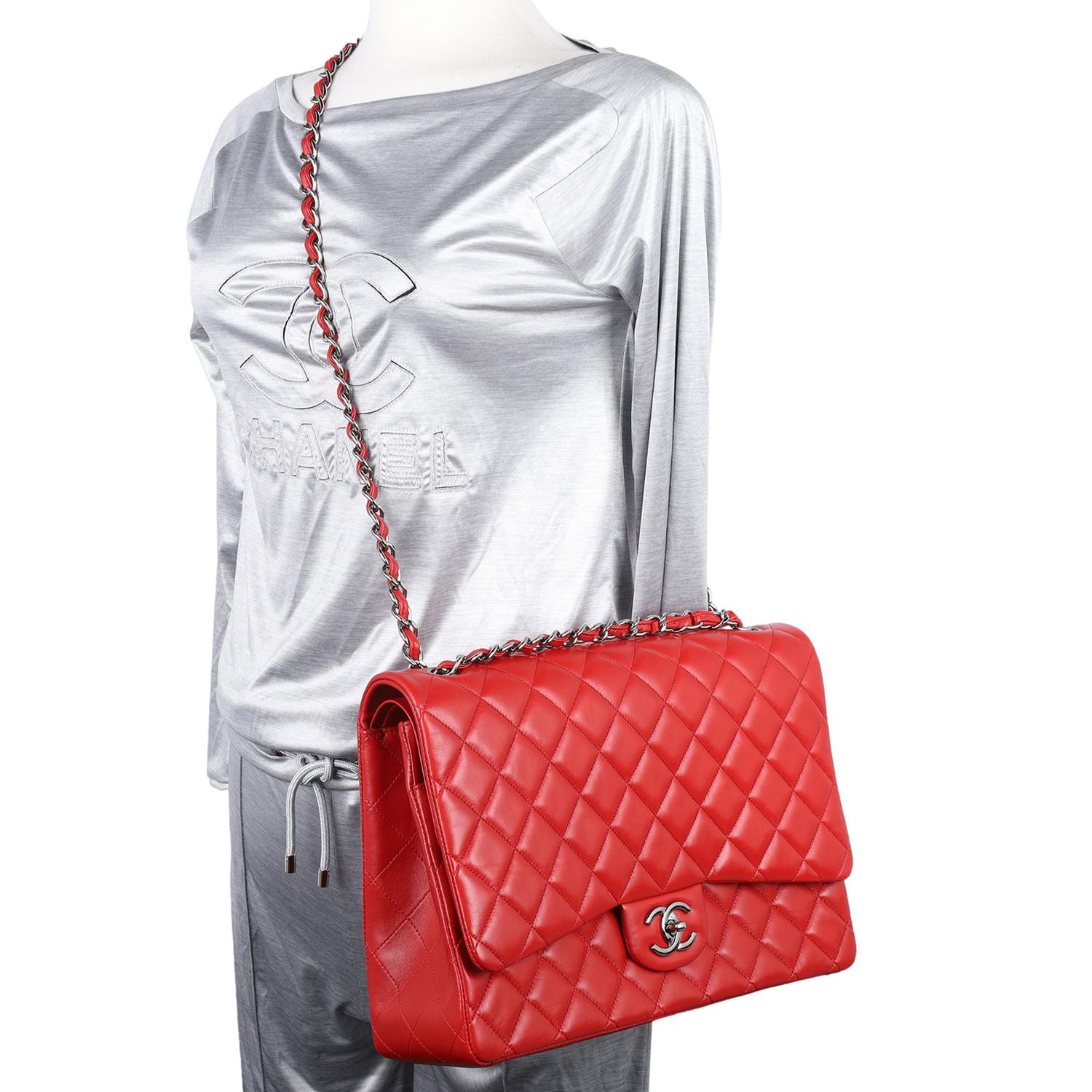 Authentic, pre-loved Chanel CC quilted Jumbo classic double flap bag in red. Features flap top with famous CC twist turn lock on the front of the bag, the exterior rear has 1 open side pocket, the interior has Chanel red leather lining double flap