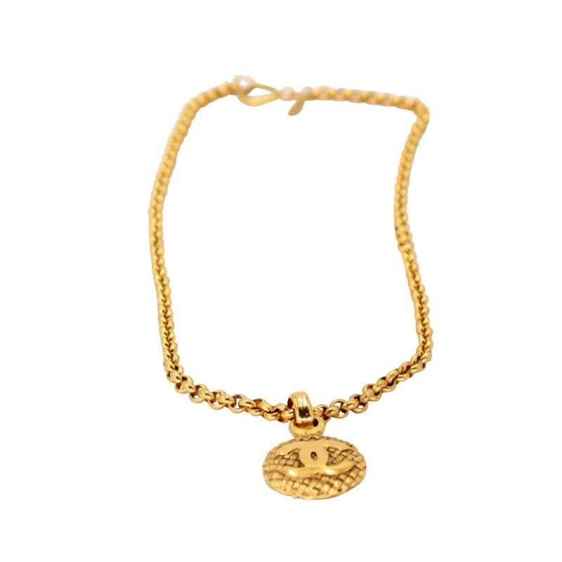 Chanel CC Coin Logo Chain Pendant 18k Plated Necklace CC-0819N-0007

Limited Edition Chanel 18K Gold Plated CC logo necklace is a true collectors' masterpiece find. This stylish necklace features a large Chanel CC and pendant with a textured