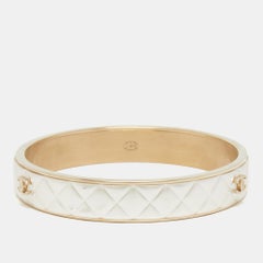 Chanel CC Composite Gold Tone Bangle Bracelet
