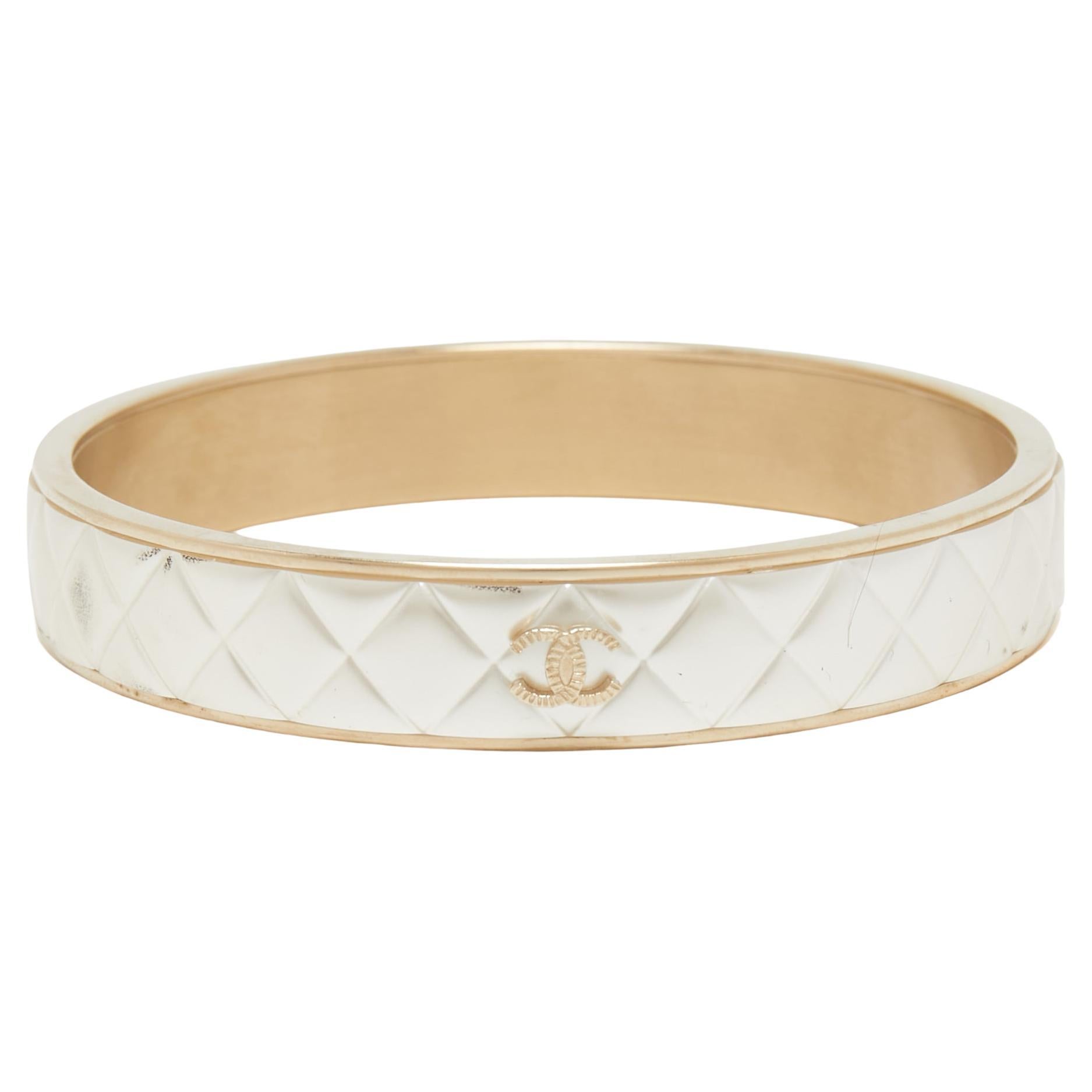 Chanel CC Composite Gold Tone Bangle Bracelet For Sale at 1stDibs