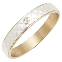 Chanel CC Composite Goldfarbenes Armreif-Armband