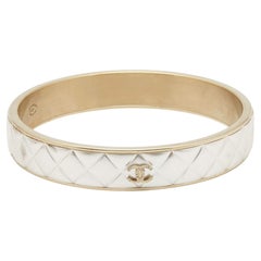 Chanel CC Composite Gold Tone Bangle Bracelet