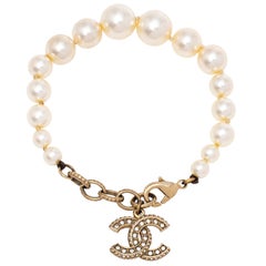 Chanel CC Cream Faux Pearl 
Crystal Gold Tone Bracelet