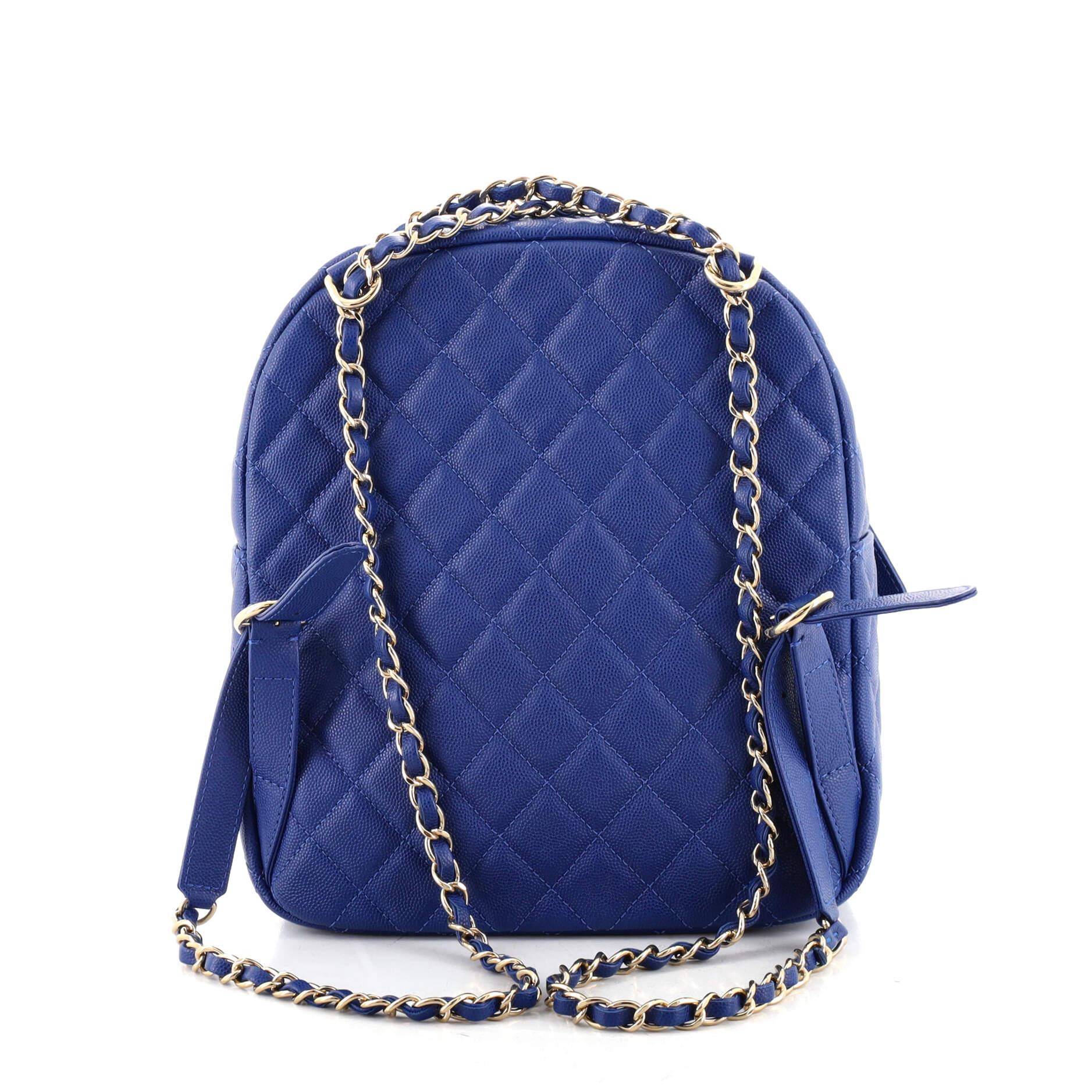 blue quilted backpack