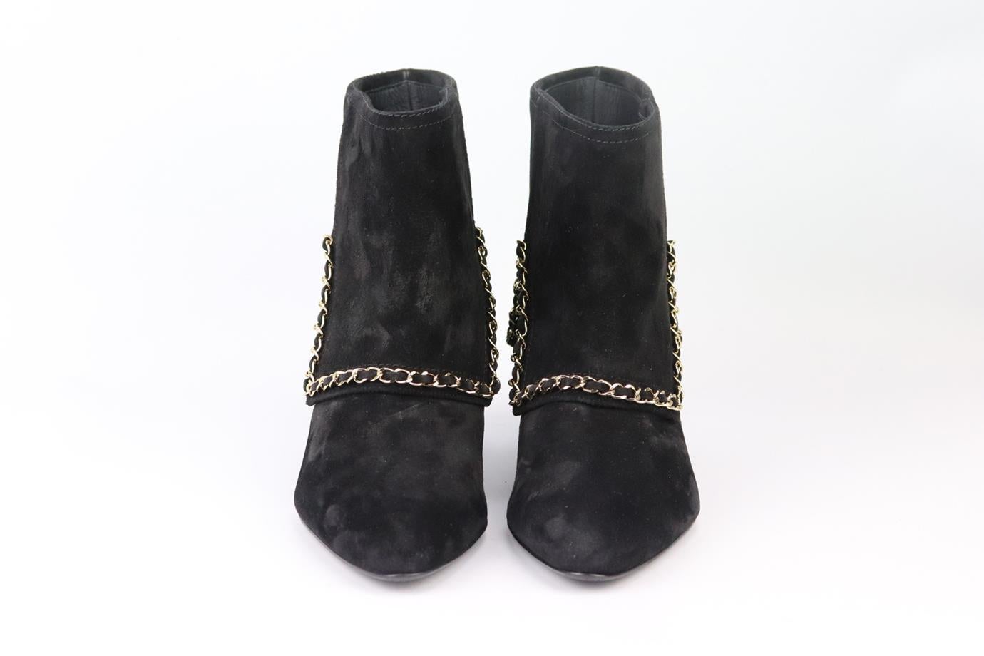 Chains are something of a signature in Chanel's collections, which we normally see in their classic flap bags, these ankle boots are made from soft suede with gold-tone chain trim and CC detail on the fold over ankle and set on an solid heel. Heel