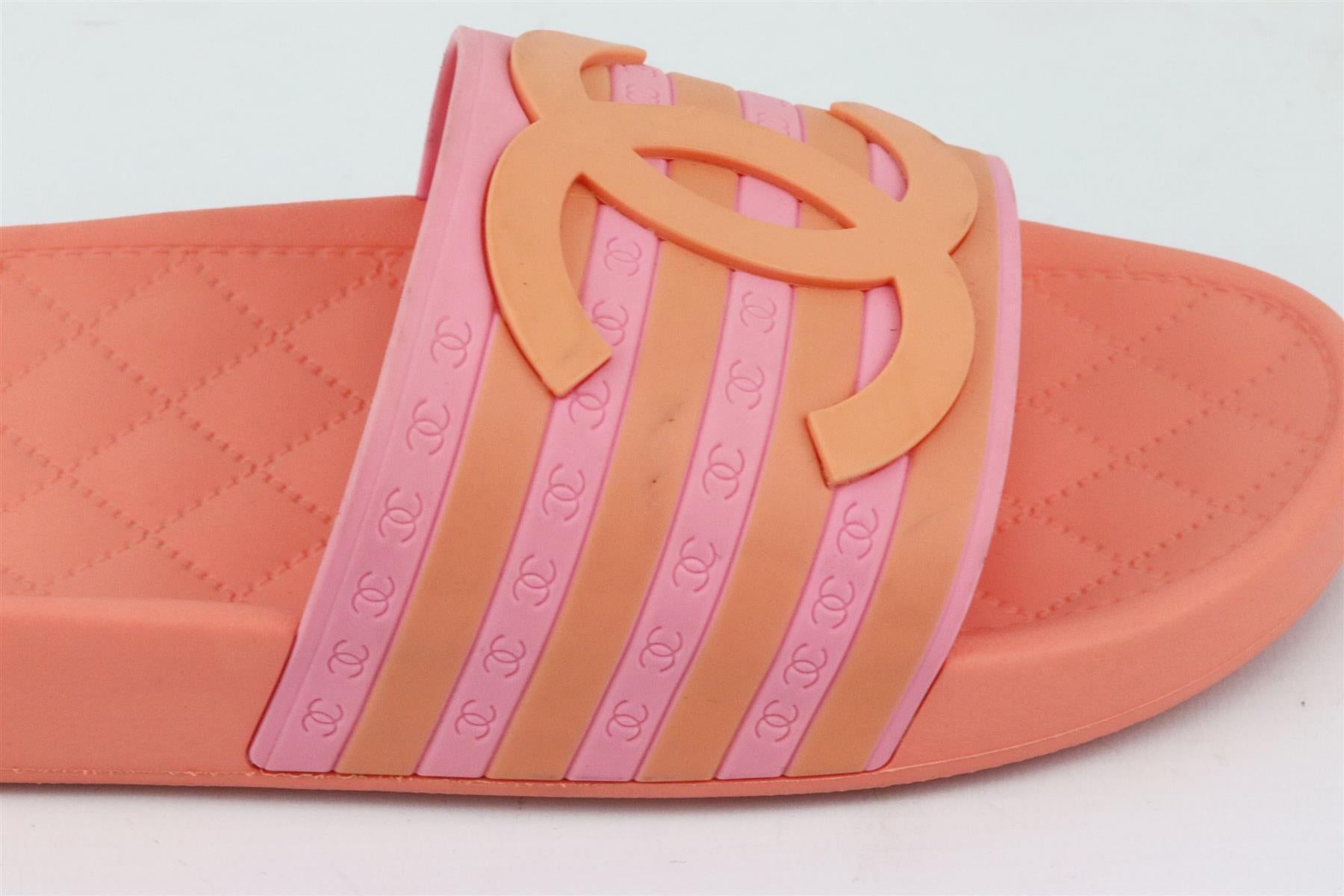 Chanel may specialize in luxurious bags, but the brand also designs great pieces that are suitable for everyday wear, these slides are made from CC detailed striped salmon and pink rubber and has a contoured footbed with gripped soles for comfort