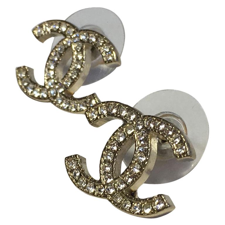 CHANEL CC Earrings in Pale Gilded Metal