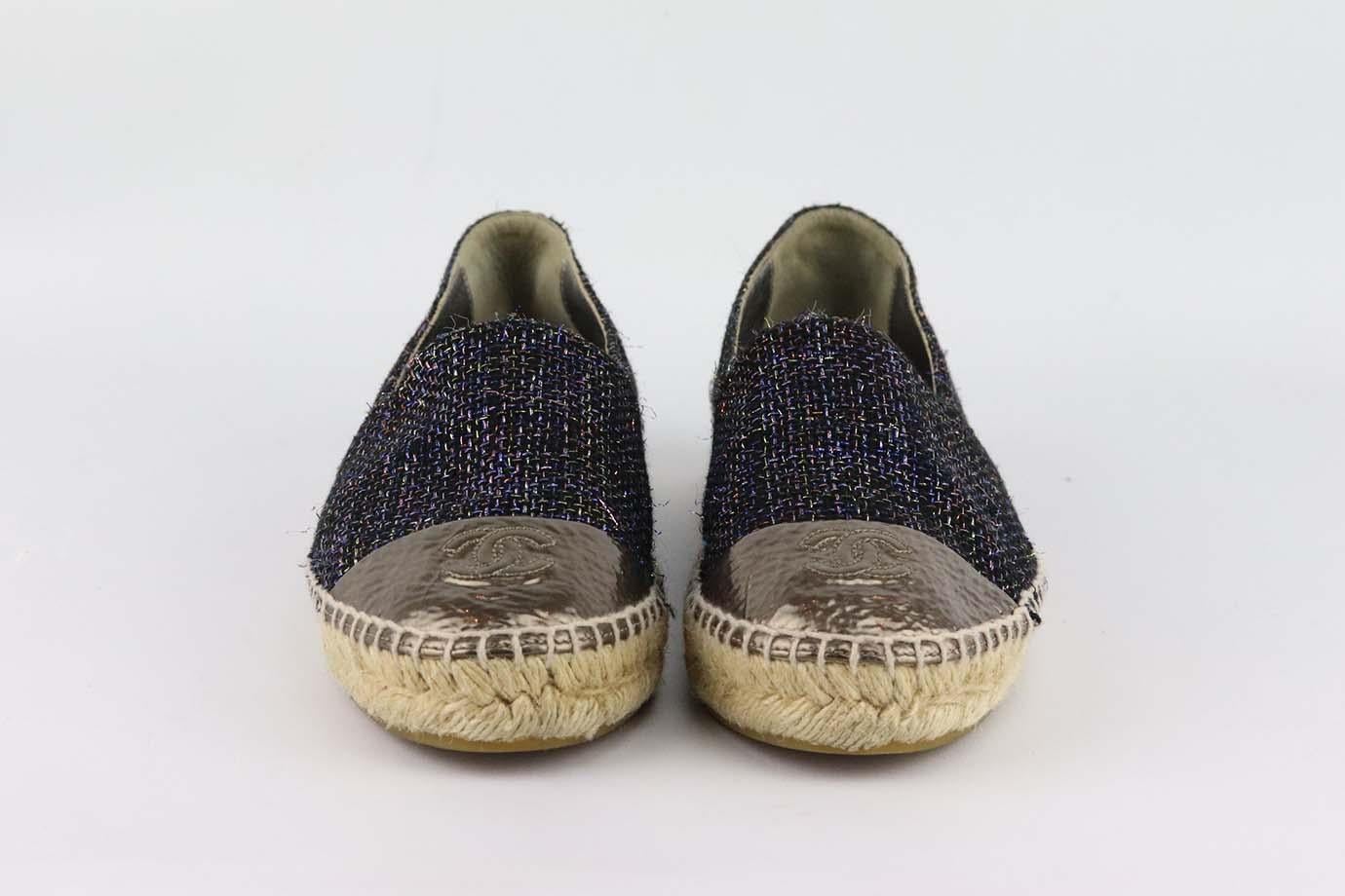 Chanel may specialize in luxurious bags, but the brand also designs great pieces, these espadrilles are made from metallic navy tweed with silver CC embroidered toe-cap, it also has a leather foot bed with gripped soles for comfort and grip. Sole