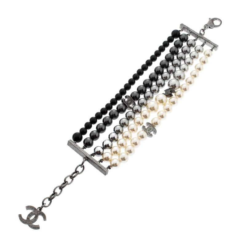 Chanel never fails to impress when it comes to bags or the usage of pearls and stones. This bracelet is designed with multiple rows of faux pearls and beads, all placed to project a saturated look. It also features the interlocking CC logos and a
