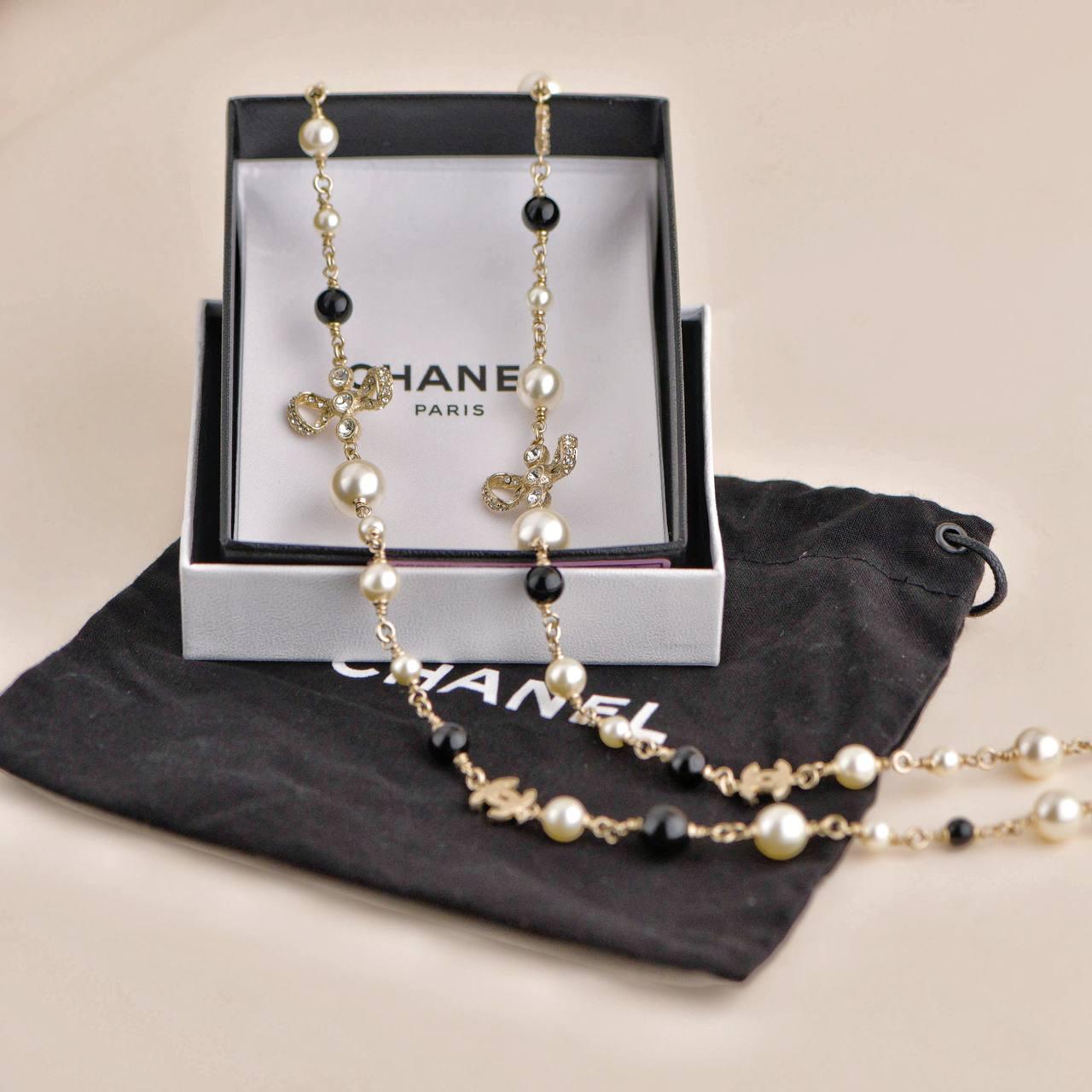 Uncut Chanel CC Faux Pearl Crystal and Bead Long Necklace For Sale