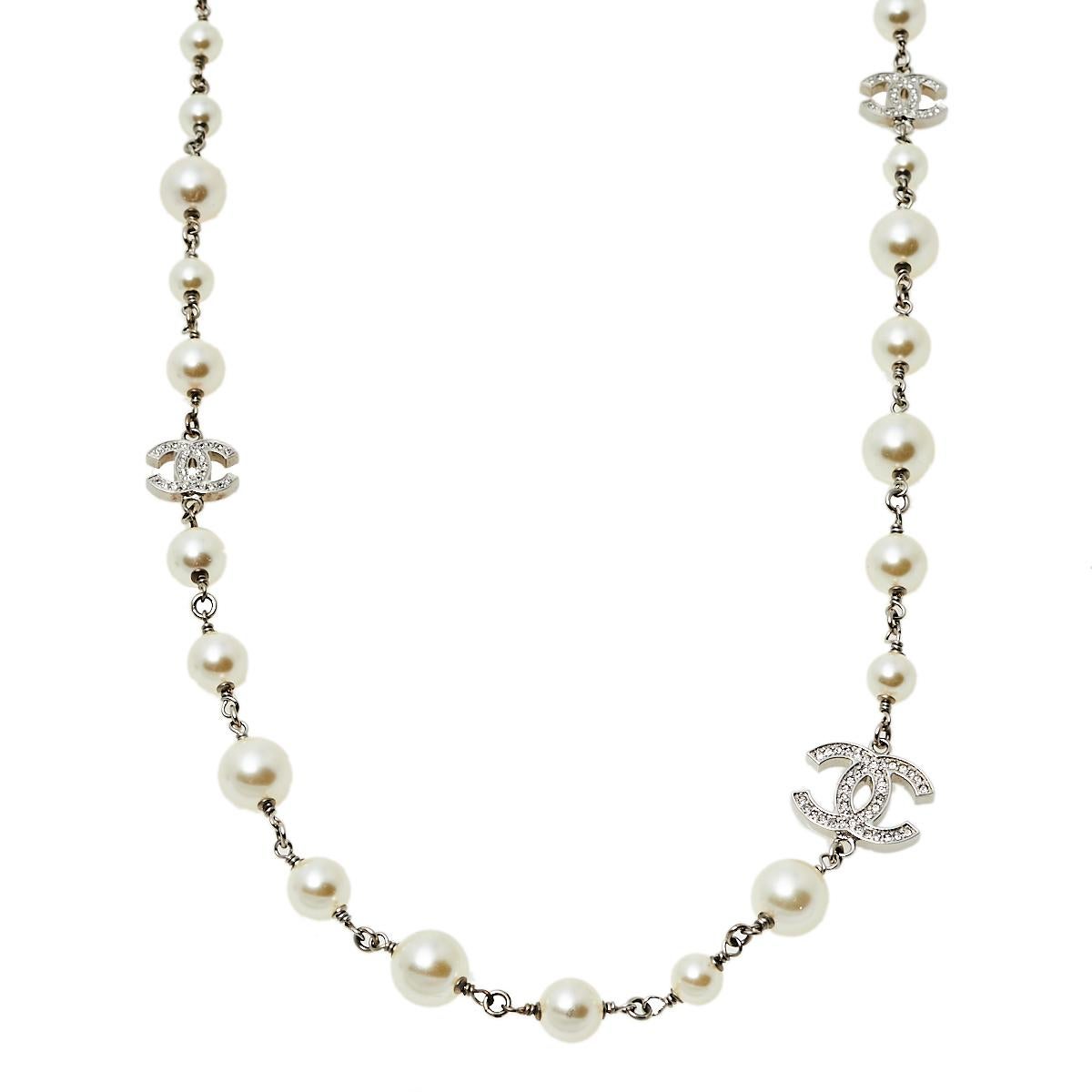 Assembled with faux pearls, crystal-embellished CC logos, this necklace from Chanel has an elegant retro vibe. It is feminine and so well-made that it will surely shine when you wear it with off-shoulder or strapless dresses.

Includes: Invoice,