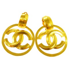 Vintage Chanel CC Gold Charm Circle Hoop Doorknocker Large Dangle Earrings 