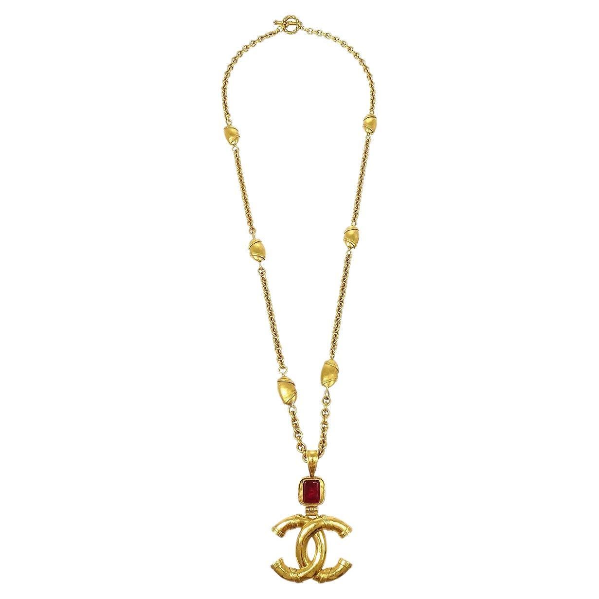 CHANEL CC Gold Metal Brown Glass Stone Gripoix Charm Dangle Drop Necklace