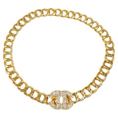 Ceinture Chanel CC à maillons en métal doré et strass avec chaîne