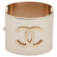 Chanel CC Gold Tone Wide Cuff Bracelet