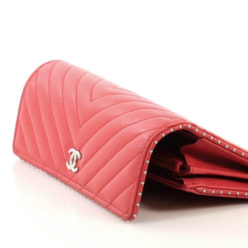 Chanel CC Gusset Flap Wallet Chevron Lambskin with Studded Detail Long In Good Condition In NY, NY