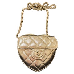 Chanel CC Heart small Clutch in gold