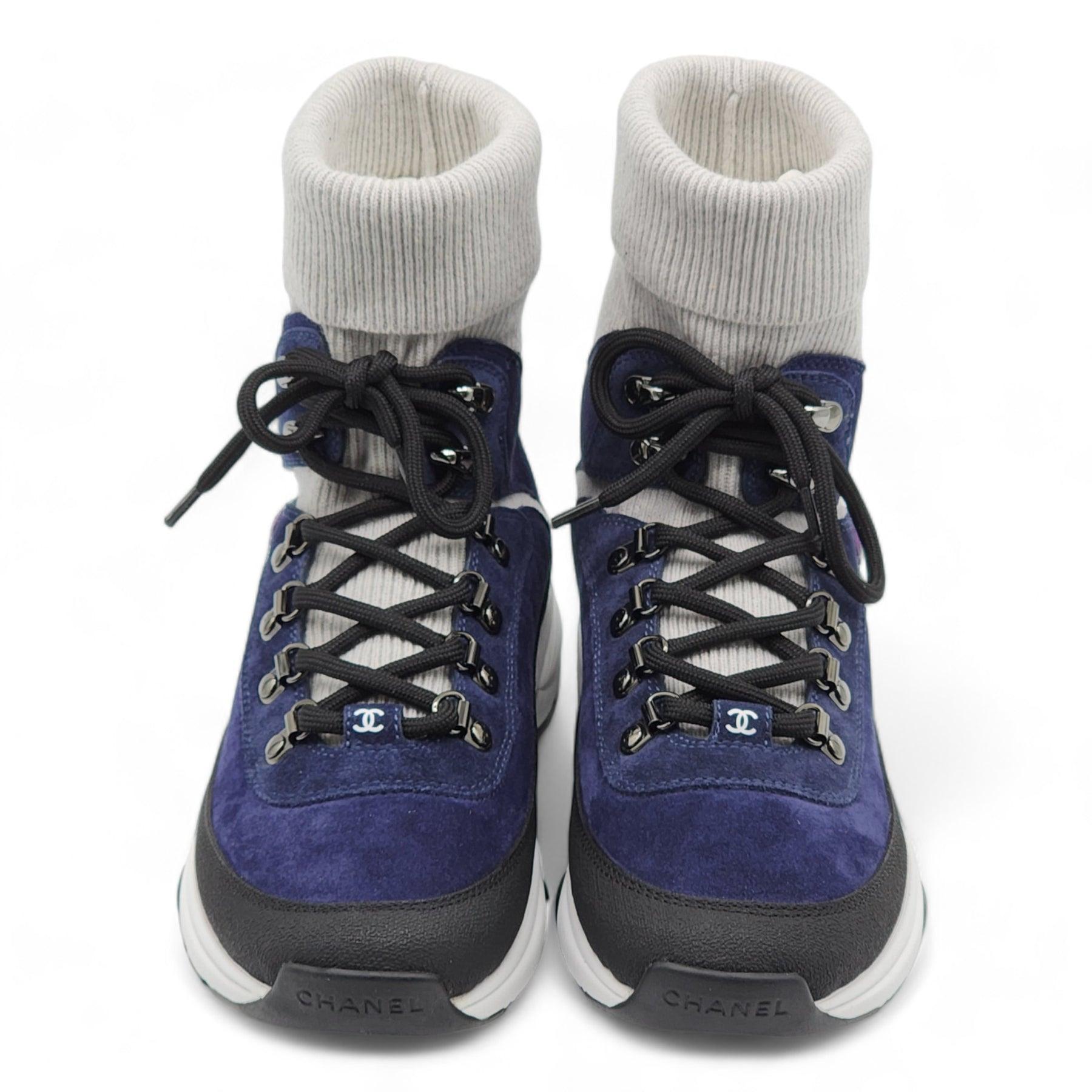 Chanel CC Hi-Top Sock Sneakers.

Additional information:
Material: Suede and knit
Style: G45204 B14065 NR384
Color: Blue
Size 39 EU (9 US Women, 6 US Men)
Country: Italy
Condition: Brand new with box. Extra laces included.