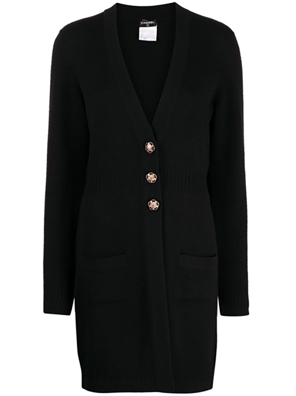 Black cashmere cardi coat Chanel with CC jewel gold-tone buttons.
Size mark 38 FR. Condition is pristine, no signs of wear.