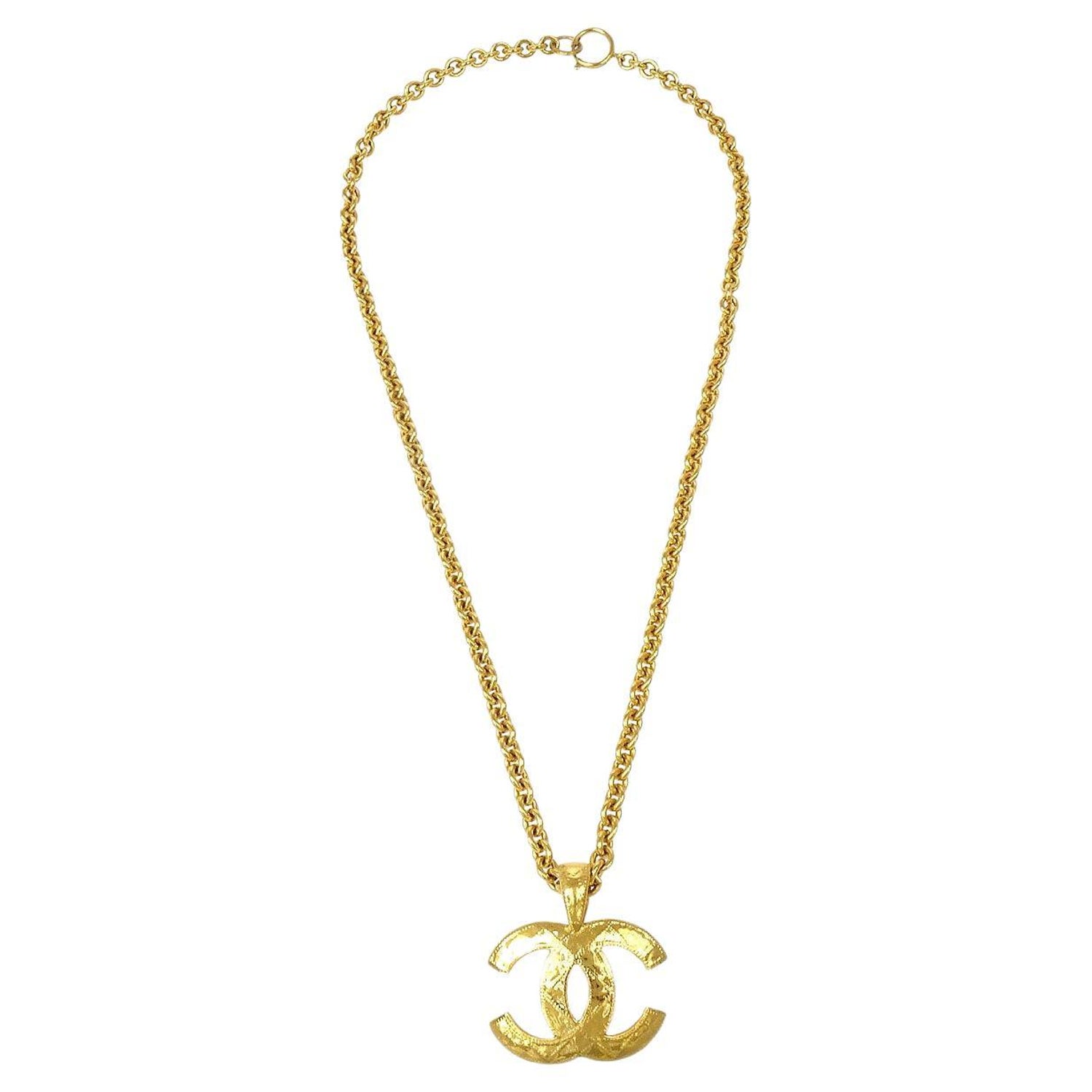 CHANEL Gold Metal Quilted Flap Bag Charm Chain Link Necklace For Sale at  1stDibs